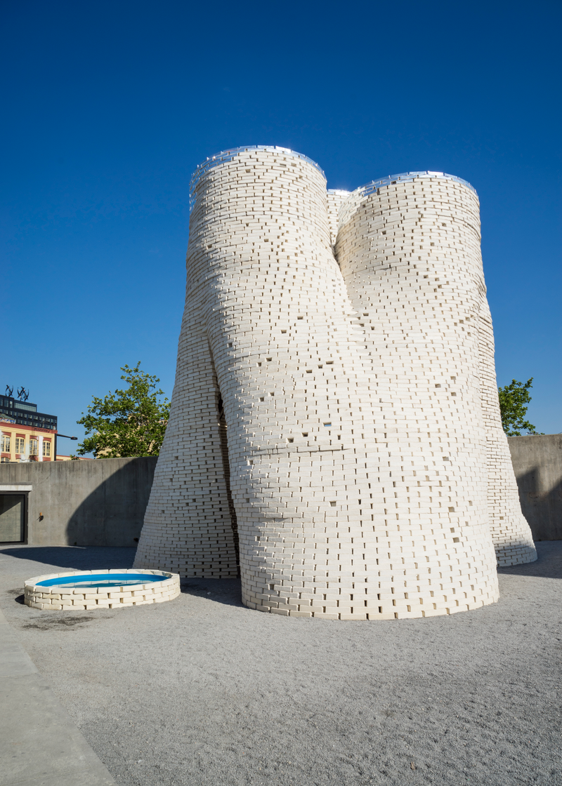 Illustration for article titled The Bricks That Built This Tower Were Grown From Fungus